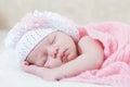 Newborn girl sleeps