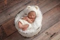 Newborn Girl Wearing a White Bear Hat Royalty Free Stock Photo
