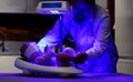 Newborn infant baby receiving phototherapy Royalty Free Stock Photo