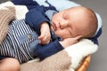 Newborn infant baby sleeping in a basket Royalty Free Stock Photo