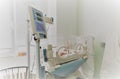 Newborn innocent baby sleeping in an incubator Royalty Free Stock Photo