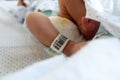 Newborn leg with barcode identification