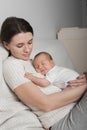 Newborn with mom. 1 month baby with atopic dermatitis Royalty Free Stock Photo