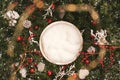 Newborn photography background - white bowl on pine tree background, with snow, pinecones and ornaments. Christmas newborn