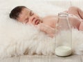 Newborn with retro bottle