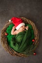 Newborn Santa is sleeping in a Christmas wreath Royalty Free Stock Photo