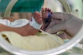 Newborn sick baby in an incubator Royalty Free Stock Photo
