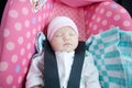 Newborn sleeping in car seat.Safety concept. Infant baby girl. secure driving with children. Baby care lifestyle. Cute baby Royalty Free Stock Photo