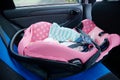 Newborn sleeping in car seat.Safety concept. Infant baby girl. secure driving with children. Baby care lifestyle. Cute baby