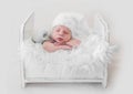 Newborn sleeping with kitten Royalty Free Stock Photo