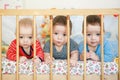 Newborn triplets are in the bed Royalty Free Stock Photo