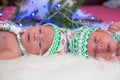 Newborn twin boys sleeping