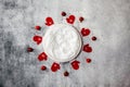 Newborn winter background - round cream bowl with CHristmas red garland on snowy backdrop