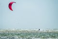 Newborough , Wales - April 26 2018 : Kite flyer surfing at Newborough beach - Wales - UK
