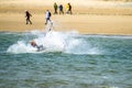 Newborough , Wales - April 26 2018 : Kite flyer surfing at Newborough beach - Wales - UK