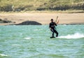 Newborough , Wales - April 26 2018: Martin Lamb is enjoying the beach with his kite