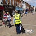 Woman wearing Corvid-19 jacket. Keep distance. Royalty Free Stock Photo