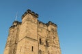 Newcastle Castle Keep viewed from below with blue sky