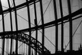 Newcastle city Skyline through Sage Gateshead windows with Tyne Bridge  and other buildings in silhouetted view Royalty Free Stock Photo