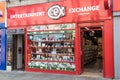 Exterior of CEX secondhand entertaiment exchange showing company logo, sign and branding. Window display of technology and electr