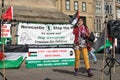 Female speaker at the Free Palestine Rally held by the Palestine Solidarity Campaign