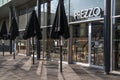 Prezzo Italian style restaurant exterior shot showing company branding, logo, signage, entrance and outside eating area