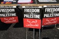 Table with posters at the Free Palestine Rally