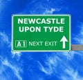 NEWCASTLE UPON TYDE road sign against clear blue sky Royalty Free Stock Photo