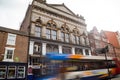 Newcastle Tyne Theatre building exterior with Stagecoach bus moving past