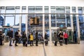 Passengers watiing at modern Bus Station. Public transport building