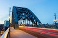 Tyne Bridge Newcastle, long exposure with blurred traffic during rush hour and blue hour. Colourful and bright Royalty Free Stock Photo