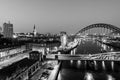 Newcastle Gateshead Quayside at night, with of Tyne Bridge and city skyline, long exposure in monochrome Royalty Free Stock Photo