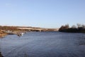 Newcastle UK: Jan 2022: Newburn Riverside at the River Tyne,  waves on a windy day with the A1 motorway bridge n Royalty Free Stock Photo