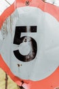 Newcastle UK: A damaged 5mph speed limit sign on a country road in England Royalty Free Stock Photo