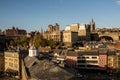 Newcastle UK: Nov 2021, View of the famous Newcastle Quayside in Autumn with beautiful warm winter sunlight Royalty Free Stock Photo