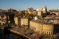 Newcastle UK: Nov 2021, View of the famous Newcastle Quayside in Autumn with beautiful warm winter sunlight Royalty Free Stock Photo