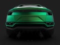 The newest sports all-wheel drive green premium crossover in a black studio with a reflective floor. 3d rendering. Royalty Free Stock Photo