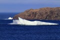 Newfoundland iceberg with crashing wave Royalty Free Stock Photo