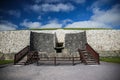 Newgrange entrance with view of the famous Triple Spiral and Diamonds designs