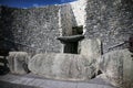 Newgrange entrance with view of the famous Triple Spiral and Diamonds designs Royalty Free Stock Photo