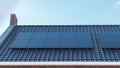 Newly build house in the Netherlands with solar panels attached on the roof against a sunny sky Close up of new building Royalty Free Stock Photo