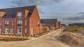 Newly built houses in modern street Royalty Free Stock Photo