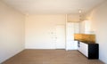 Newly built kitchen in empty living room