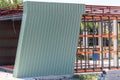 Newly built metal framed building with siding. Construction of a new tiny house. selective focus Royalty Free Stock Photo