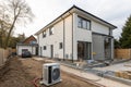 Newly built modern detached house with heat pump Royalty Free Stock Photo