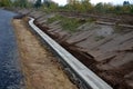 A newly built road, on the layer of which you can see successive