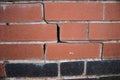 Newly constructed brick wall with subsidence damage visible cracking Royalty Free Stock Photo