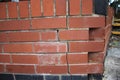 Newly constructed brick wall with subsidence damage visible cracking Royalty Free Stock Photo