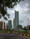 Newly constructed commercial skyscrapers and empty land for ri criation ground in front Sanpada cercal Navi mumbai