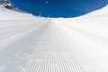 Newly groomed ski slope on a sunny day Royalty Free Stock Photo